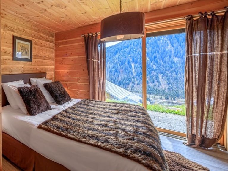 Chalet-appartement Le Savoyard met buiten-whirlpool