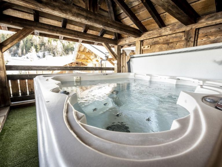 Chalet du Cocoon Pierra Menta 1 met sauna en gedeelde buiten-whirlpool