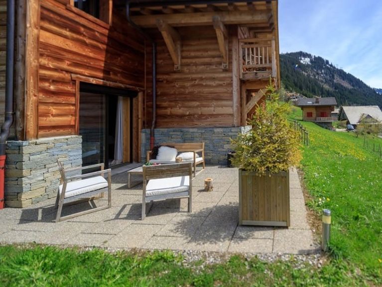 Chalet-appartement Le Savoyard met buiten-whirlpool