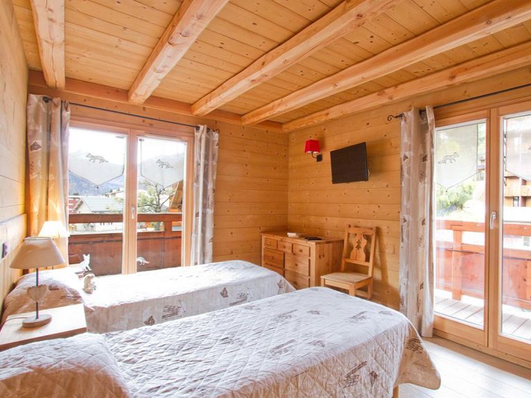 Chalet Le Renard Lodge met privé zwembad en sauna