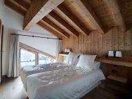 Chalet-appartement Chalet 2000 met buiten whirlpool-10