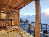 Chalet-appartement Chalet 2000 met buiten whirlpool-3