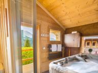 Chalet Le Joyau des Neiges met sauna en whirlpool-17