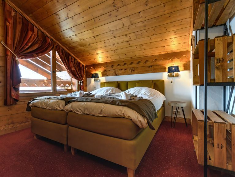 Chalet Le Hameau des Marmottes met familiekamer en sauna