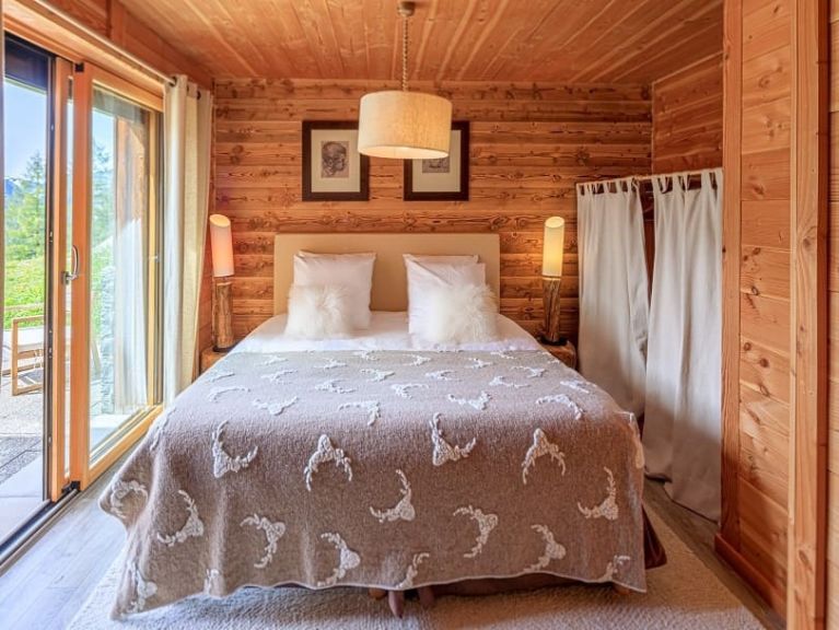 Chalet-appartement Le Savoyard met buiten-whirlpool
