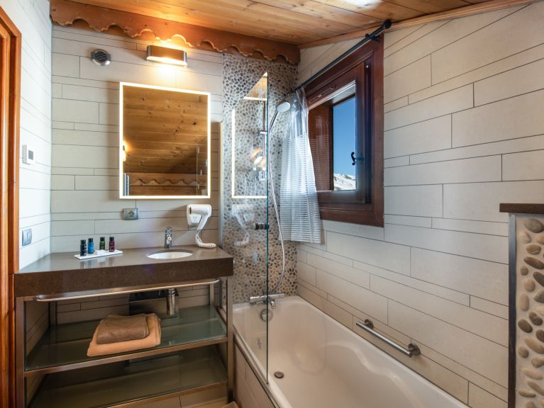 Chalet Le Hameau des Marmottes met familiekamer en sauna