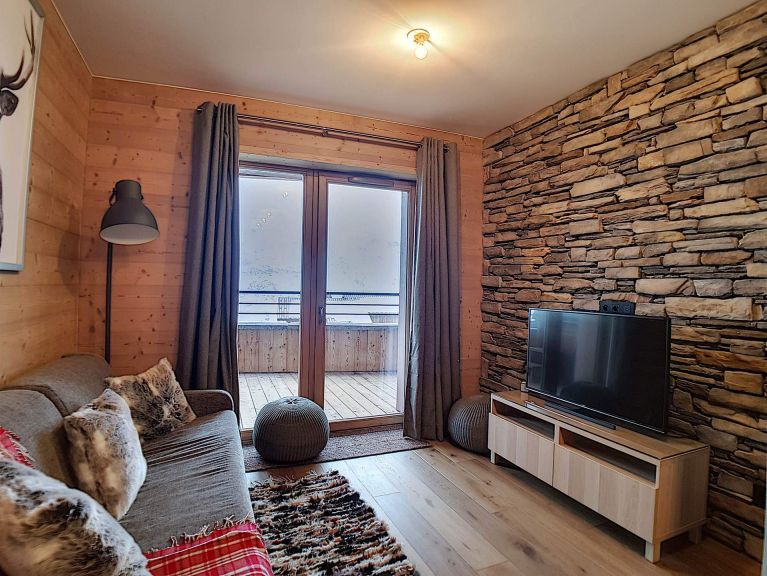 Chalet-appartement Chalet 2000 met buiten whirlpool